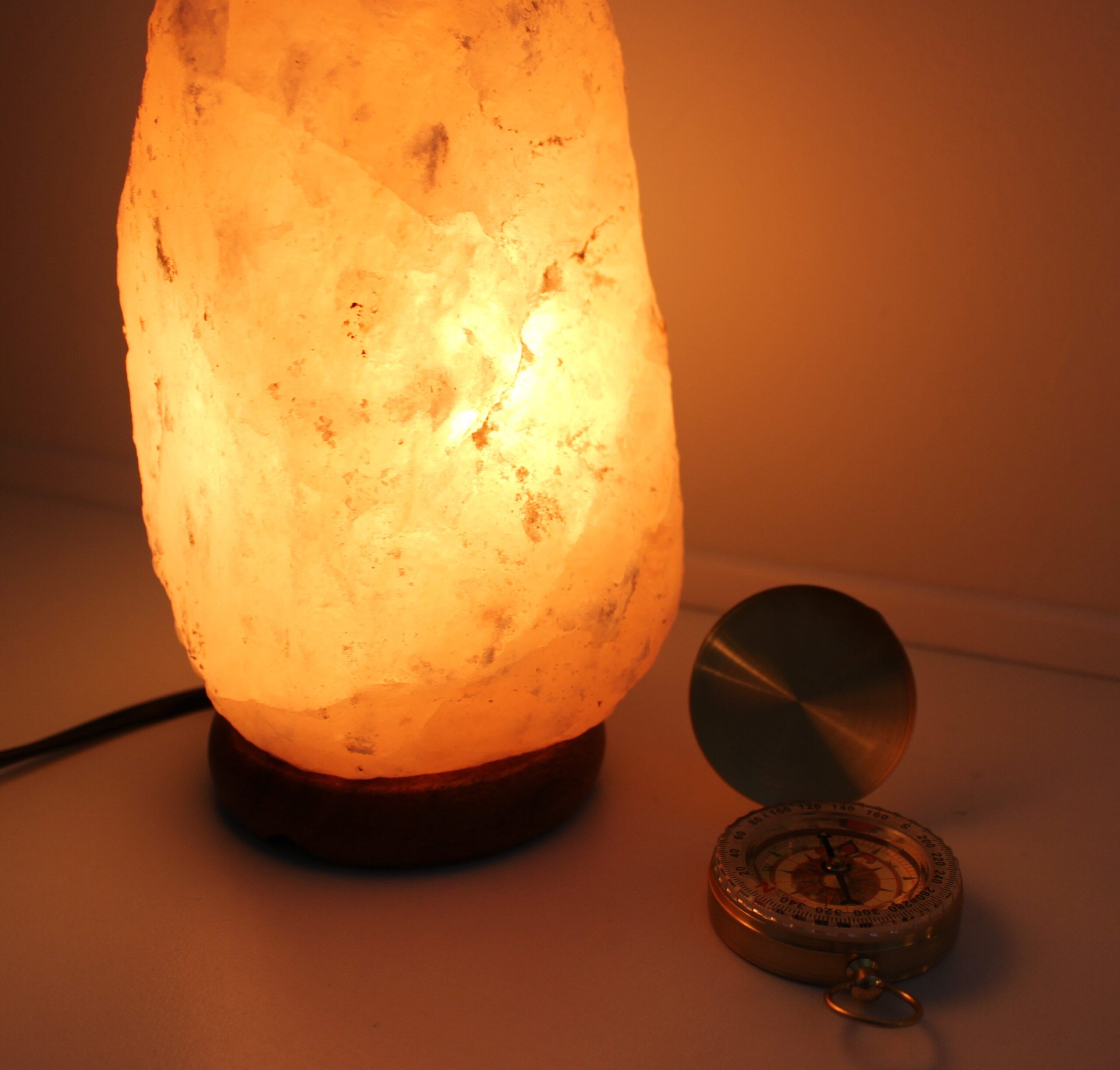 Glowing lamp and compass